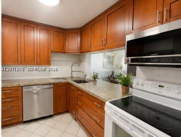 Photo of 215 SE 3rd Ave #308C, Hallandale Beach, FL 33009 (MLS # A12071876)