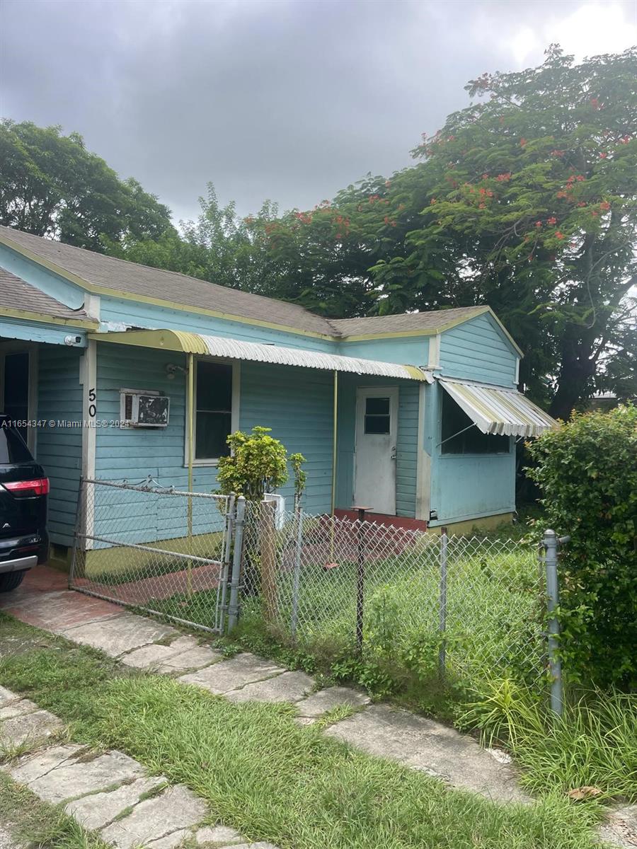 Charming 2-bedroom, 1-bathroom home with an additional efficiency featuring its own bathroom (or use as a 3-bedroom, 2-bathroom setup). The property sits on a 5,151 sq. ft. lot zoned T5 O, located in a rapidly developing area just 10 minutes from Wynwood, 15 minutes from South Beach, and 5 minutes from I-95. This zoning allows for the construction of commercial spaces, warehouses, or buildings up to 5 stories. Currently rented on a month-to-month basis, with flexible tenant options.