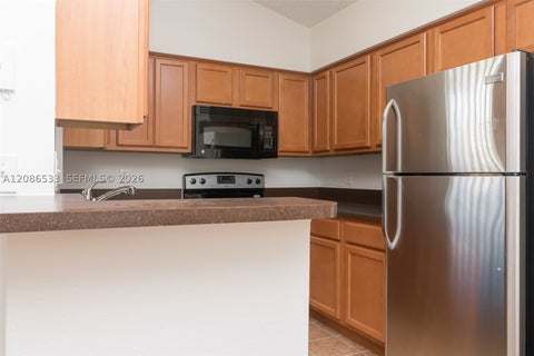 Photo of 7680 Westwood Dr #831, Tamarac, FL 33321 (MLS # A12086533)