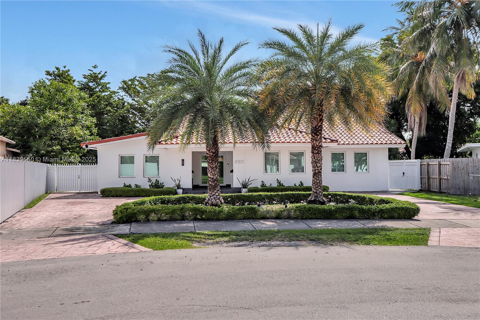 Beautifully remodeled 4-bedroom, 4-bath single-family home in the heart of Westchester! Sitting on a spacious 14,000 sq ft lot, this 2,800 sq ft residence offers a rare layout with two master suites and generously sized bedrooms throughout. Enjoy an open-concept kitchen with top-of-the-line appliances, perfect for entertaining and everyday living. The home features impact windows, a dedicated laundry room, and a gym/lounge space in the backyard—ideal for fitness, work, or relaxation. Step outside to a large, fully fenced yard with plenty of room for a pool or outdoor entertaining. Centrally located. A true gem in one of Miami’s most sought-after neighborhoods!