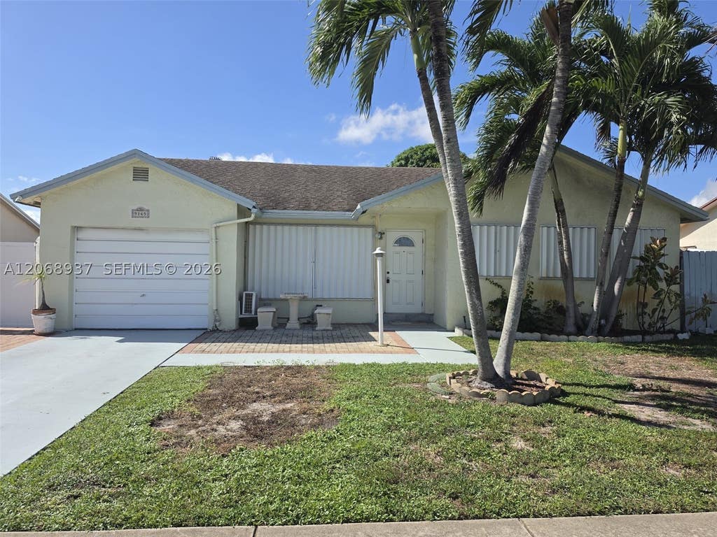 Photo of 9165 SW 18th St #1, Boca Raton, FL 33428 (MLS # A12068937)
