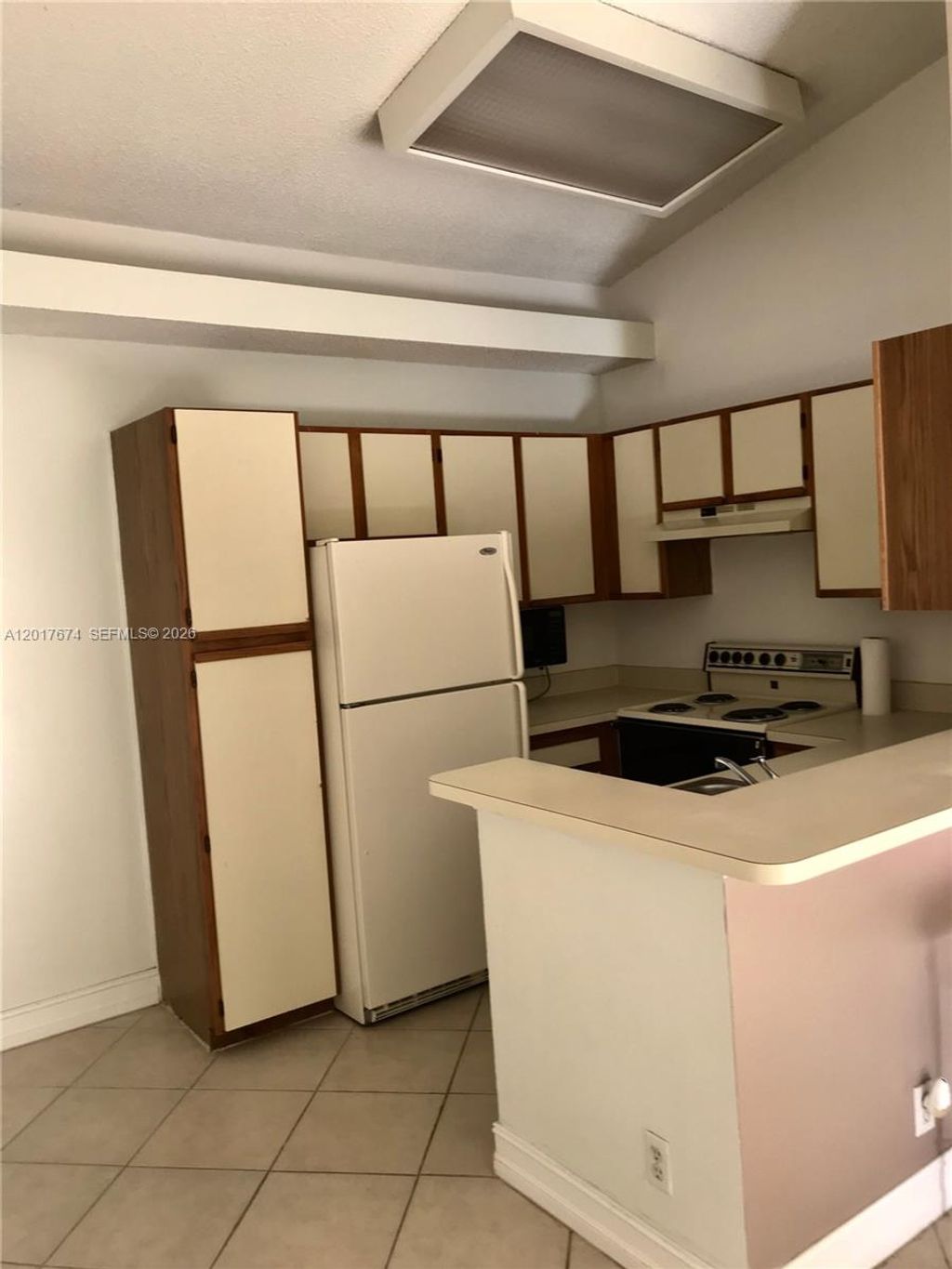 Photo of 651 Lyons Rd #10204, Coconut Creek, FL 33063 (MLS # A12017674)
