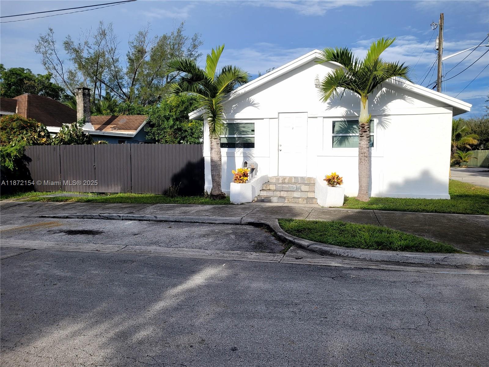 Charming 3-bedroom, 1-bath single-family home in the heart of Little Haiti, near Wynwood and the Design District. Freshly painted with a new fence, this corner property offers privacy and a large open yard—perfect for outdoor enjoyment. Across from a school, ideal for families. Bright interior with wall units in each bedroom, plus wall-mounted closets being installed. Includes refrigerator and stove, with washer/dryer hookups for tenants to bring their own. Landscaping and trash are covered by landlord; tenants handle water, internet, and electricity. SECTION 8 welcome. Minisplit located in the living room as well as separate wall units in all the bedrooms. Sublease potential depending on terms. Not currently listed but RENT TO OWN-- FOR SALE -- SELLER FINANCING AVAILABLE!!