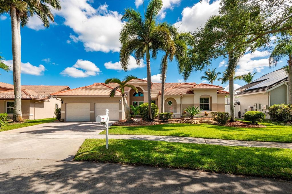 Photo of 18253 NW 15th Ln, Pembroke Pines, FL 33029 (MLS # A12011829)