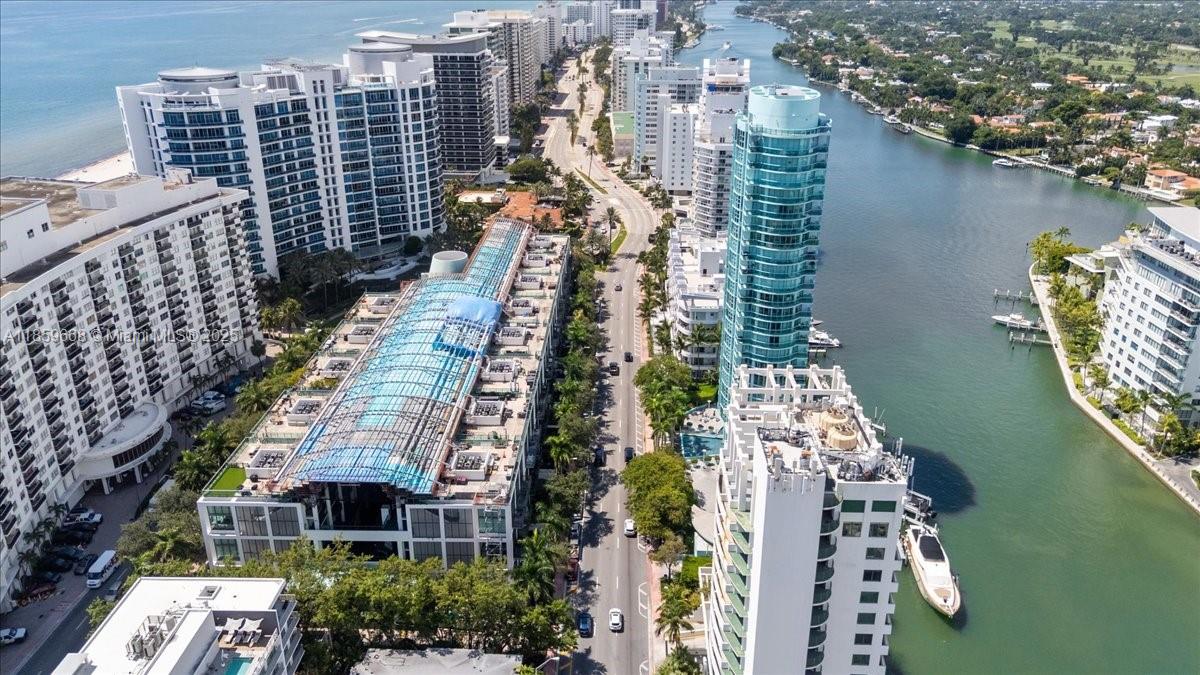 Welcome to luxury living in the heart of Miami Beach! This stunning 3-bed, 2-bath condo that feels like a townhome at Terra Beachside Villas offers soaring 18-ft ceilings, floor-to-ceiling windows, and a private terrace perfect for entertaining. Enjoy a sleek open kitchen with high-end appliances, spacious bedrooms with spa-like baths, and direct access to lush tropical gardens. Amenities include a Zen-inspired atrium, fitness center, jacuzzi and pool. Steps from the beach, shops, and dining. Ideal for end-users or investors seeking style and location. No special assessment. Potential rental income of $5500-$6000