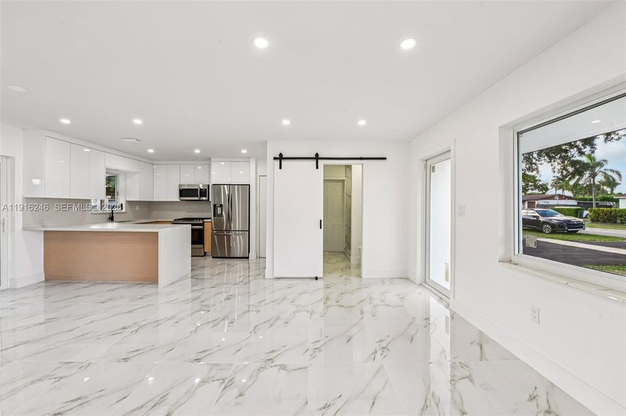 Fully renovated 3BD/2BA home on an oversized 11,000 SF lot featuring a brand-new roof, impact doors/windows, modern open layout, and detached concrete garage with multiple uses. Seller is motivated and offering contribution toward buyer’s closing costs. Bring all offers!