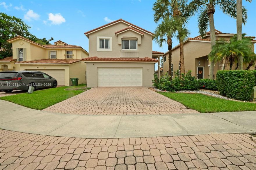 This beautiful 3 bedrooms, 2 1/2 bathrooms, 2-car garage, two-story single family home with a lake view!! This home is in the gated community of Grand Palms Golf & Country Club located in Pembroke Pines!! This home has many, many great features!! The kitchen features tiled floors, marble countertops, wood cabinets with backsplash & stainless steel appliances!! This homes also features decorative stone walls, vaulted ceilings, wood & laminate floors!! This home has a home office with marble desktops, build in cabinetry with bookshelves!! This home has a designated inside laundry area with washer & dryer!! This home has all newly painted exterior walls of the house & backyard with patio!! Near Pembroke Gardens, restaurants, parks, hospitals & great Charter schools! Near I-75 and Pines Blvd!