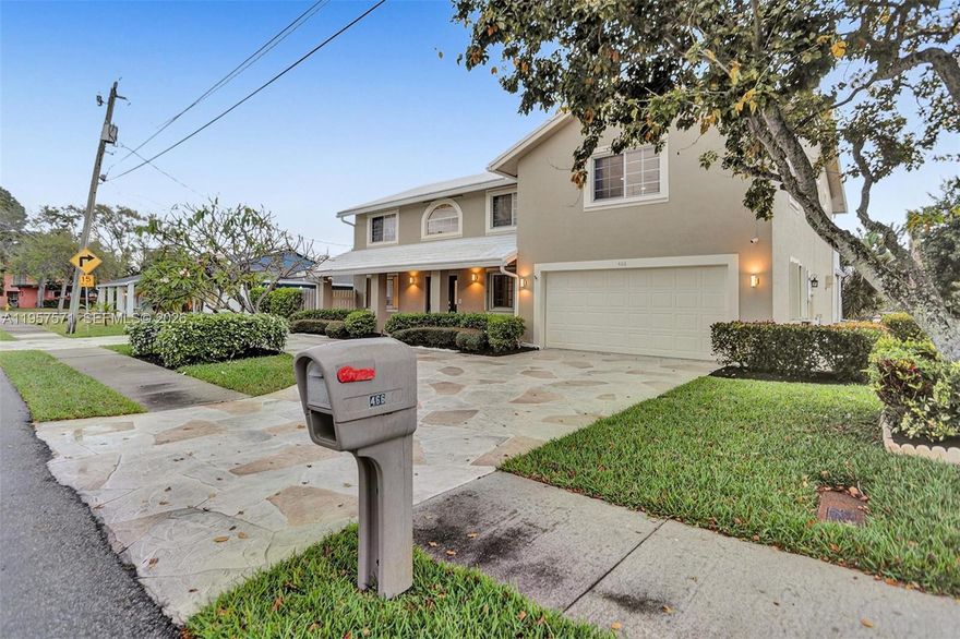 Exquisite and truly one-of-a-kind, this custom-built 6-bedroom, 3-bath estate residence offers 3,151 square feet under air and is ideally positioned on a prime corner lot in the sought-after Hillsboro Heights community. A circular driveway,resort-style pool, and new whole-house generator set the tone for refined South Florida living.
Designed for both elegance and functionality, the home welcomes you with a dramatic two-story foyer, formal living and dining rooms, and a beautifully appointed kitchen featuring a center island, pantry, breakfast area, and lunch counter, seamlessly flowing into a spacious family room

Outdoor living is elevated with a 60-foot covered patio, Move-in ready and ideally located just one mile from the beach, offering the ultimate blend of luxury, comfort, and coastal lifestyle.The second level offers three additional bedrooms, a full bath, a large laundry room, walk-up attic storage, and a private primary suite with its own sitting/family room, expansive bath with jetted tub, separate shower, and dual vanities. Outdoor living is enhanced by a 60’ covered patio, second-floor balcony, sparkling pool, and lush surroundings. Additional features include a new whole-house generator, solar hot water system, X flood zone, and numerous upgrades throughout. Move-in ready and conveniently located just 1 mile from the beach. Above Ground Jacuzzi Fire Place Furniture Availabe for Purchase all you need is your toothbrush