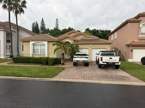 Photo of 9771 NW 32nd St, Doral, FL 33172 (MLS # A12079085)