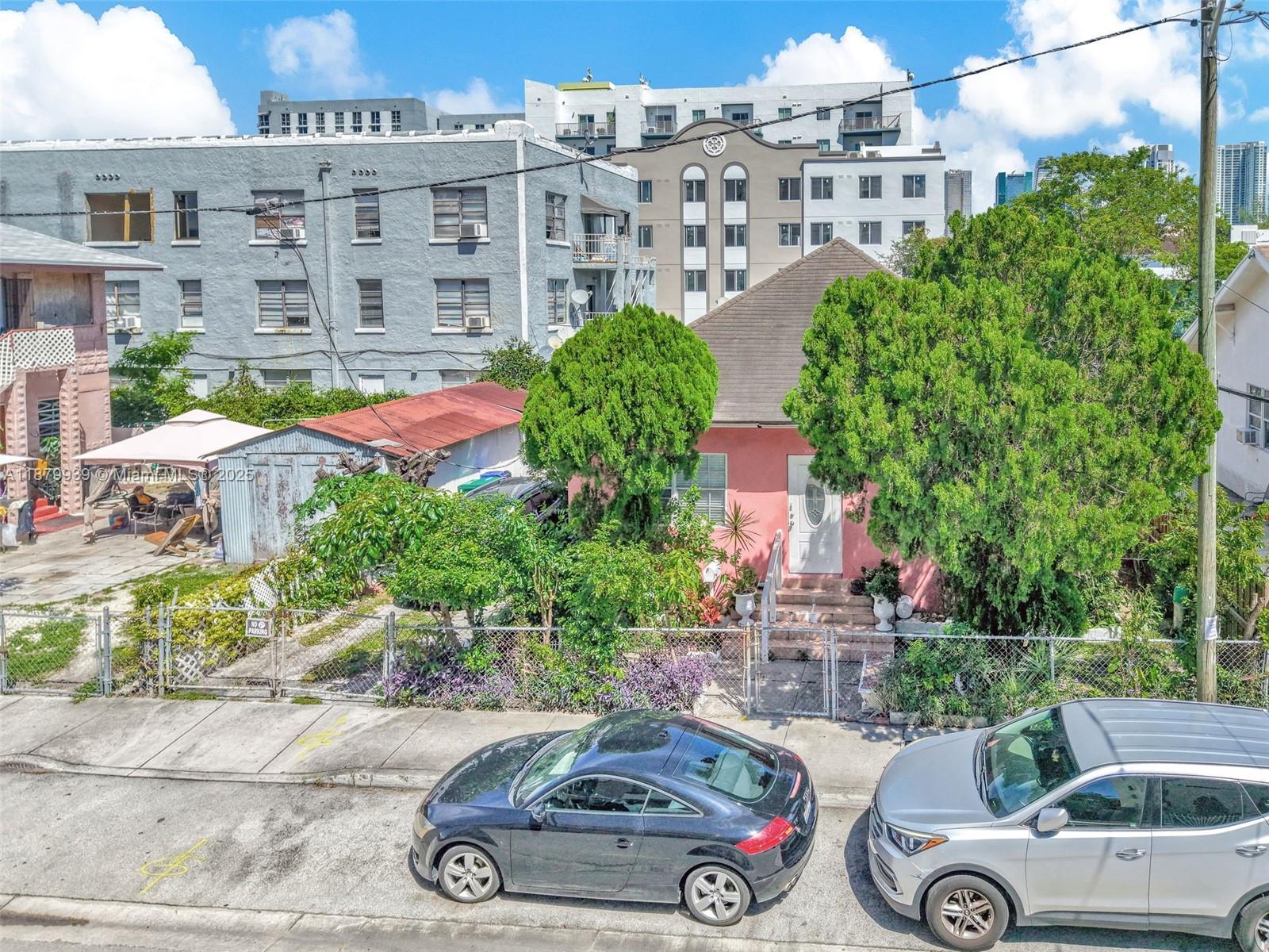Prime development and investment opportunity minutes from Brickell! This 5,000 SF lot with T6-12-O zoning is ideal for high-density mixed-use residential or commercial projects in one of Miami’s fastest-growing corridors. Currently improved with a 3 bed / 2 bath home plus a detached 1/1 garage unit, the property also offers rental income potential while plans and permits are secured. The adjacent corner parcel (MLS #A11705841) is also available, together creating a 9,500 SF assemblage. Surrounded by new developments and thriving businesses, this property presents outstanding upside for developers and investors seeking a premier location near Brickell, Wynwood, and Downtown. Search for Listing # A11705841 to view both.
