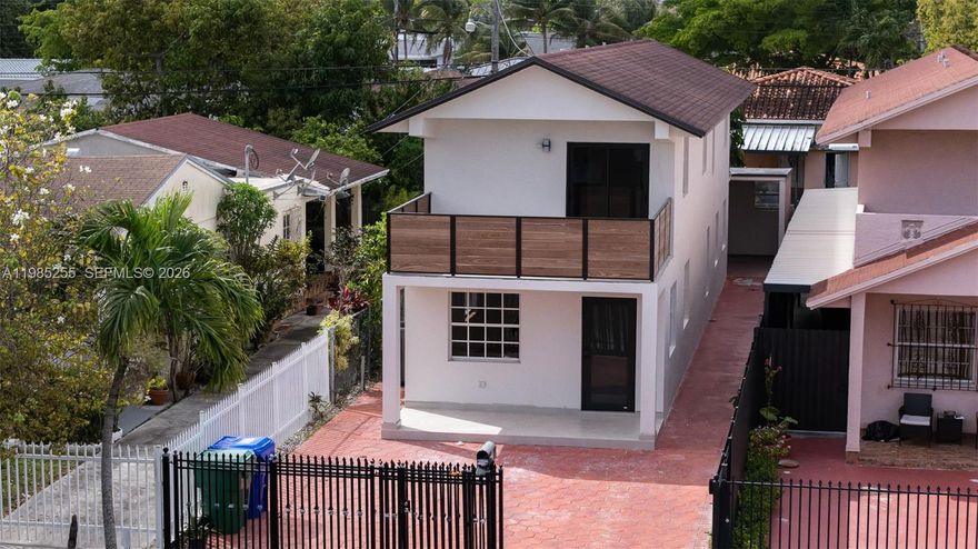 Completely reimagined from top to bottom, this fully renovated residence offers a seamless blend of modern design and thoughtful craftsmanship while maintaining its original layout for optimal functionality. Every detail has been carefully curated. The exterior has been entirely transformed with new stucco and sealing, delivering both durability and striking curb appeal. Step outside to enjoy brand new balconies crafted with premium thermal ash wood, adding a warm, sophisticated touch to the home’s outdoor spaces. Inside, the kitchen stands as a true centerpiece, featuring elegant shaker-style, lacquer-finished millwork paired with stunning Taj Mahal countertops perfectly balancing style and practicality. Throughout the home, you’ll find new laminate flooring, solid oak window sills, and beautifully finished solid oak stair treads that elevate the overall aesthetic. Every room is equipped with brand new custom closets and sleek single-panel doors, while the bathrooms have been completely remodeled with new vanities, fixtures, and toilets offering a spa-like, move-in-ready experience. To complete the renovation, the home features brand new impact sliding glass doors and a new front entry door, providing peace of mind, energy efficiency, and a polished finish. This is a rare opportunity to own a meticulously upgraded home where no detail has been overlooked truly turnkey and ready for its next owner.