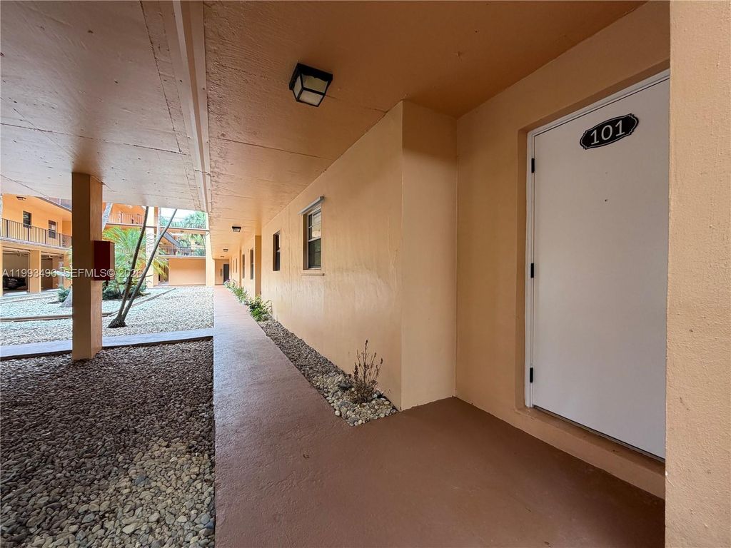 Photo of 400 Commodore Dr #101, Plantation, FL 33325 (MLS # A11993496)