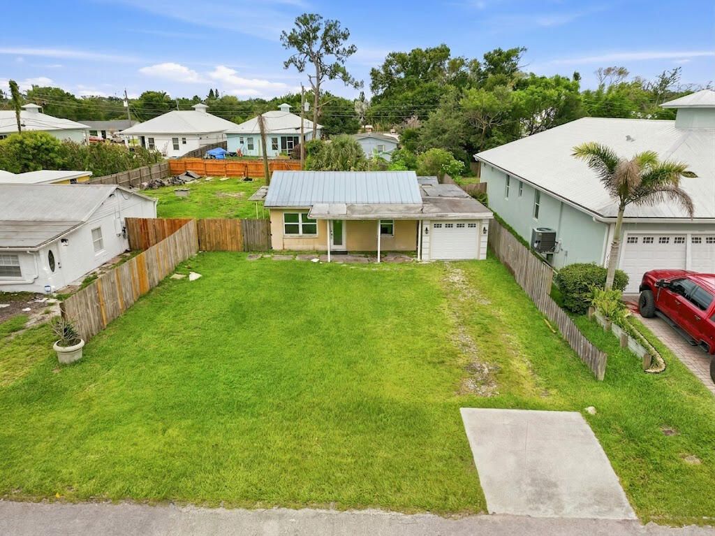Photo of 996 SW 34th Terrace, Palm City, FL 34990 (MLS # B26037317)
