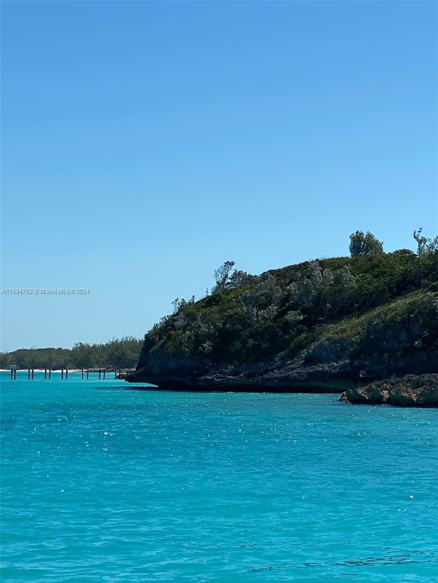 The sound of silence, peace & tranquility await you. 6 acre peninsula at the extreme end of Rolleville. Open zoning can be transformed into mixed uses in the luxury categories of a boutique or condo hotel, multi or single family ocean front paradise. Its location is clandestine and affords privacy. For expansion, neighboring properties exist that can be developed into a full service marina for luxury yachts and a combination of all that you can imagine.  There are big name residents from a global footprint who have private residences in Exuma and the Cays, so you and your guests may feel at home away from home. Development costs can be lowered by the existence of access to key infrastructure. The international airport is 20 minutes away. Sandals is nearby with an 18 hole golf course.