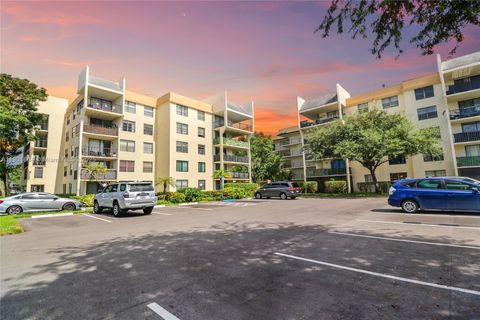 Photo of 6190 Woodlands Blvd #308, Tamarac, FL 33319 (MLS # A11901884)