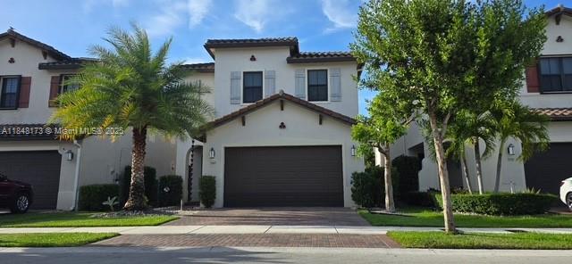 Beautiful two story, three bedroom and two and a half bath home in the highly sought after community of Bonterra . This amazing home is in impeccable condition with upgrades including; impact windows and a fenced in backyard with pavers ideal for family gatherings and entertaining . Additionally, this home features very spacious rooms , master bath with separate shower and tub, stainless appliances, large two car garage and wood flooring upstairs. Bonterra is a secure, family friendly community with a plethora of amenities ; multiple playgrounds, soccer field, tennis courts, clubhouse, pool, and many events throughout the year for residents. Centrally located within minutes of the Turnpike and Expressway, many fine dining establishments, top rated schools, and Miami Airport.