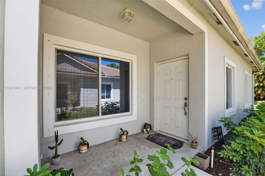 Photo of 1221 SW 48th Ter, Deerfield Beach, FL 33442 (MLS # A11991661)