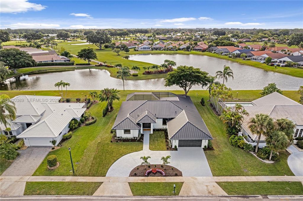 Photo of 11127 Boca Woods Ln, Boca Raton, FL 33428 (MLS # A11930389)