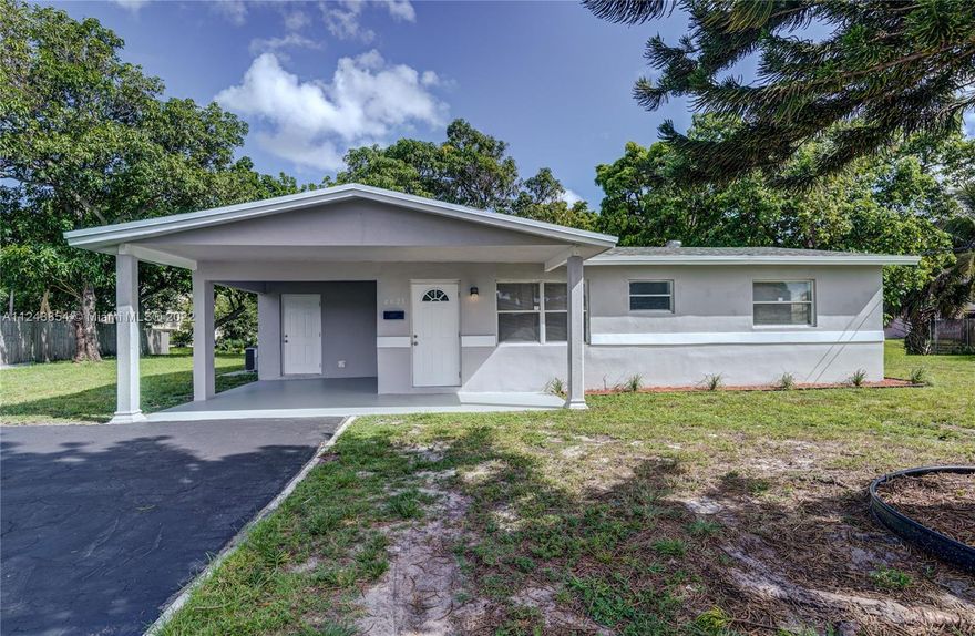 Come and visit this amazing property for sale. BRAND NEW ROOF INSTALLED IN 2022. An amazing one-story house, beautifully updated 4 Bedroom, 2 Bathroom, freshly painted. Updated throughout including floors, and bathrooms. The kitchen has stainless steel appliances and quartz countertops, and a laundry room with a full-size washer and dryer. Rare opportunity in the area. HUGE LOT with beautiful canal view and mature trees.*** 
The carport has a long driveway with plenty of spaces for cars, No association, No HOA, and No restrictions come and schedule your appointment today.