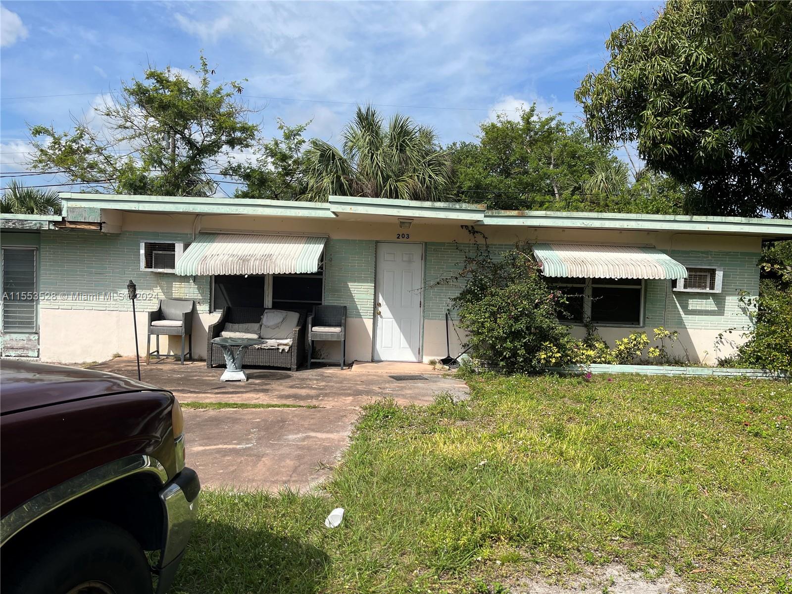 Property for Sale at 203 Nw 27th Ter Ter, Fort Lauderdale, Broward County, Florida - Bedrooms: 3 
Bathrooms: 2  - $310,000
