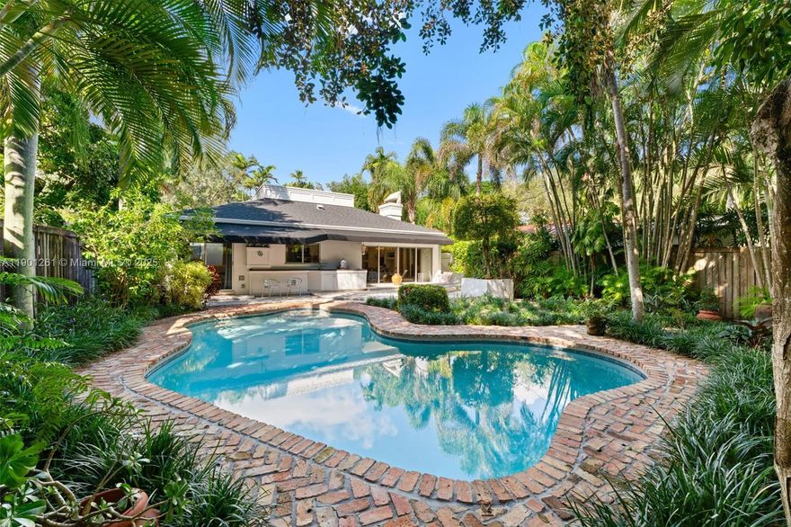 Timeless. Welcome to 4110 El Prado. This move-in-ready Coconut Grove residence blends classic Grove character with modern design and thoughtful upgrades. Built as a 3-bedroom and currently configured as 2 plus a den, it features elegant Italian travertine floors imported from Italy, bright skylights, and a renovated primary bathroom. The private pool and manicured backyard create a tranquil retreat, perfect for entertaining or everyday relaxation. With a new roof completed in 2023 and located outside a flood zone, this home offers lasting quality and peace of mind. Set on a quiet, tree-lined street near parks, marinas, top schools, and Grove Village shops, it delivers a true Coconut Grove lifestyle under $2 million.