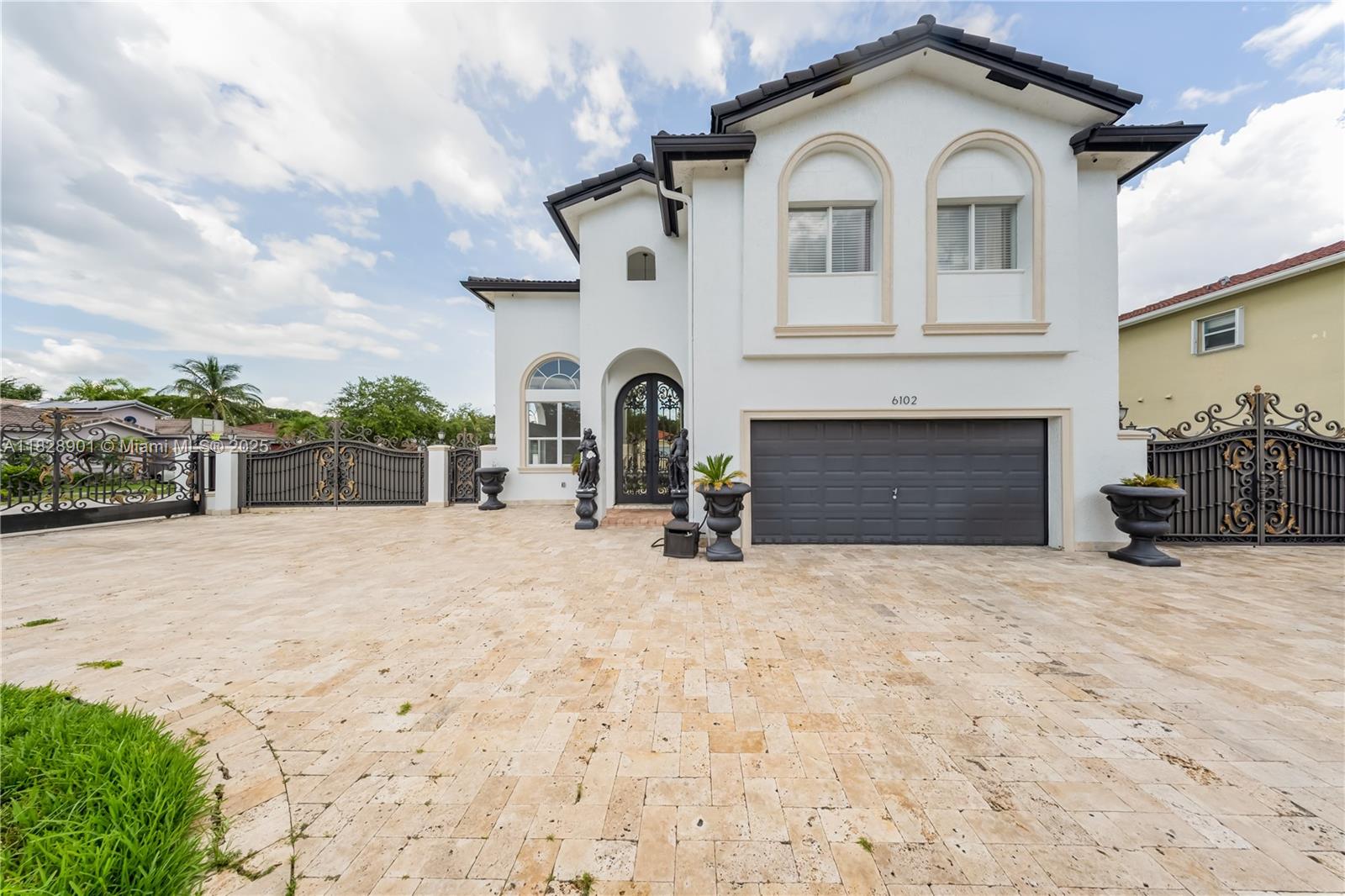 This beautifully upgraded 4-bedroom, 3-bath home sits on a huge corner lot, offering an abundance of outdoor space and curb appeal. Enjoy the convenience of a spacious front and backyard with room to park a boat or RV, plus a two-car garage. Inside, you’ll find soaring high ceilings, elegant porcelain floors throughout, and a grand marble stairway. All bedrooms feature custom-built brown wood closets that combine style with functionality.
The backyard oasis is perfect for entertaining, complete with a pool surrounded by terraced flooring for a sleek and clean look.