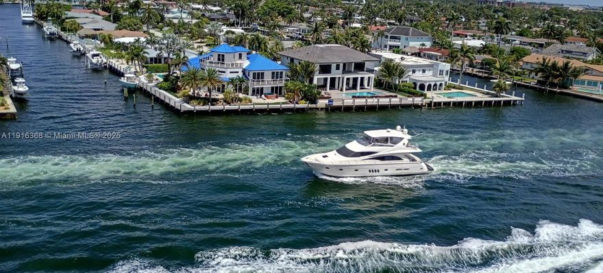 Sitting Directly on the Intracoastal Waterway this lovely 2 bedroom 2 bath unit is located in an amazing multi million dollar waterfront neighborhood. This unit offers stunning views of the intracoastal waterway and canals from the living room, master bedroom, and private balcony and ocean views from the kitchen, guest bedroom and open air hallways. Enjoy plenty of natural light thanks to floor to ceiling impact windows thru-out the unit. This well maintained secure building has LOW HOA FEES and offers exceptional amenities. Heated pool on the intracoastal, fitness center, sauna, billiards social room with kitchen, bbq area, and Community dock. Also included is extra storage and bike storage. Just one block from the ocean/beach, restaurants, bars, shops, fishing pier and more.