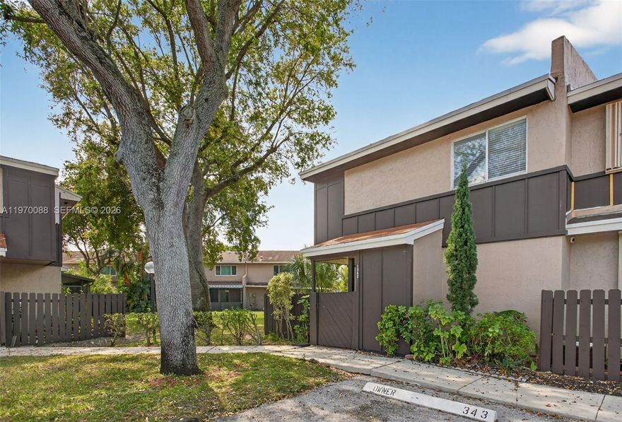 Corner-unit charm meets everyday convenience in this updated townhome in The Hamptons. Light-filled living and dining areas feature tile floors and flow seamlessly from the kitchen, complete with its own breakfast area, into the main open dining and living space, creating a comfortable and functional layout. A convenient half bath is located on the main level for guests. Upstairs, all bedrooms offer privacy, including a generous primary suite with walk-in closet. Fresh interior paint and updated lighting enhance the home, with laminate flooring throughout the second level. One of the true highlights is the expansive wraparound screened patio overlooking peaceful green space. Fully re-screened, this outdoor retreat offers exceptional privacy and extended living space rarely found in townhomes. Second-floor washer and dryer for everyday convenience. Community pool and all-ages lifestyle, plus an ideal location near shopping, dining, and major highways. Leasing permitted after one year of ownership, offering future flexibility.