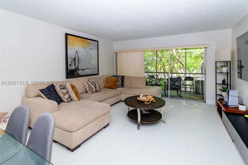 Photo of 469 N Pine Island Rd #B308, Plantation, FL 33324 (MLS # A12057319)