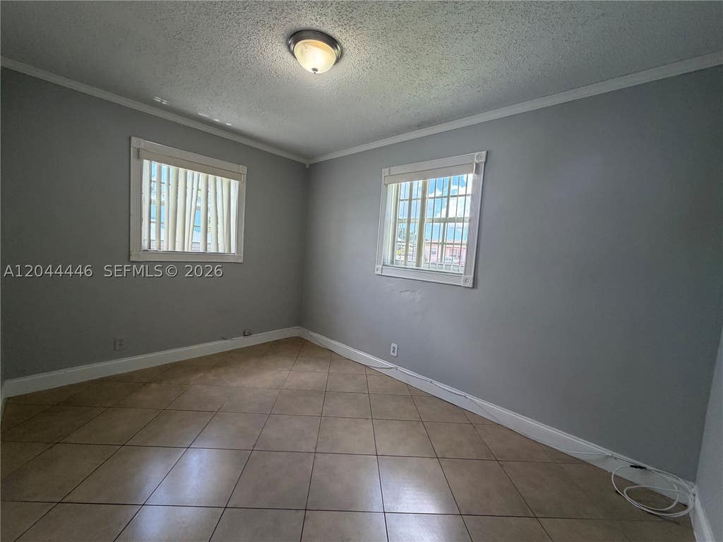 Photo of 7395 Garfield St, Hollywood, FL 33024 (MLS # A12044446)