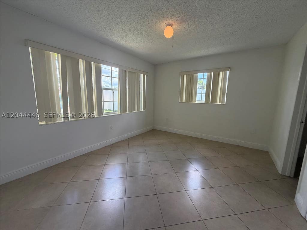 Photo of 7395 Garfield St, Hollywood, FL 33024 (MLS # A12044446)