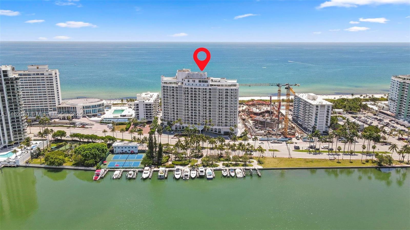 Live the ultimate Miami Beach lifestyle in this spacious residence on Millionaire's Row. Enjoy ocean and Intracoastal views from your private balcony. Floor plan includes a primary bedroom, two full baths, and a flexible den/office easily used as a second bedroom. New hurricane-impact windows and sliding doors. 50-YEAR CERTIFICATION DONE. ALL SPECIAL ASSESSMENTS PAID. Resort-style amenities: direct beach & boat dock access, oceanfront heated pool & jacuzzi, fitness center, tennis, basketball & racquetball courts, on-site restaurant, mini-mart, salon & more. Maintenance covers electricity, water, cable, internet, trash, and one assigned covered parking space. Located in a top school district—rare find in a fully updated, financially sound building.