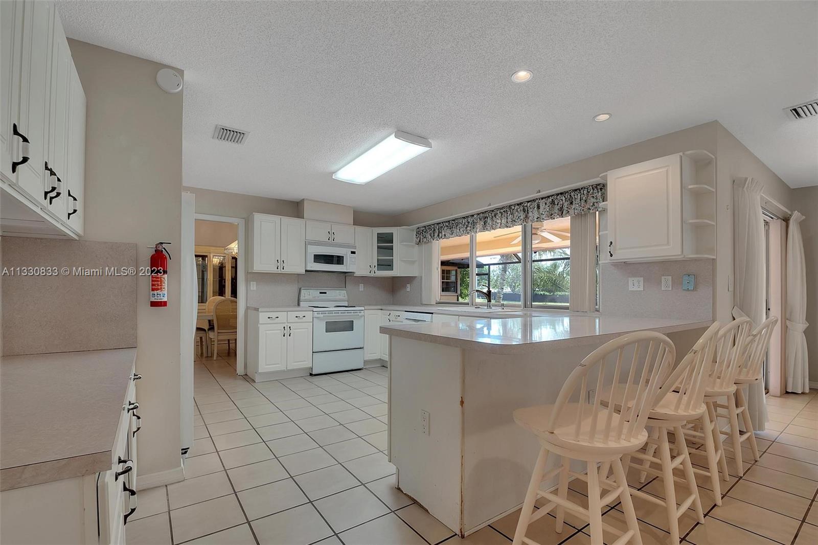 Photo 9 of 44 of 14890 SW 152nd Ct house