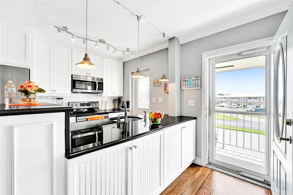 Photo of 1117 Lake Ter #211, Boynton Beach, FL 33426 (MLS # A11638906)