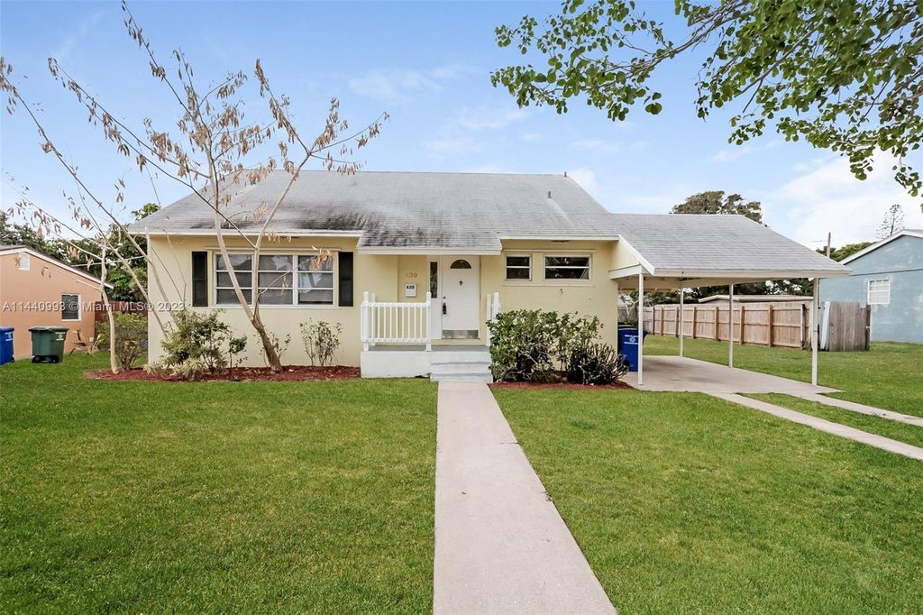 Photo of 630 Foresteria Dr, Lake Park, FL 33403 (MLS # A11440993)