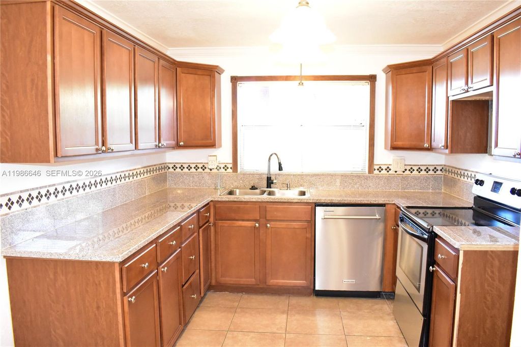 Photo of 9561 Sunrise Lakes Blvd #106, Sunrise, FL 33322 (MLS # A11986646)