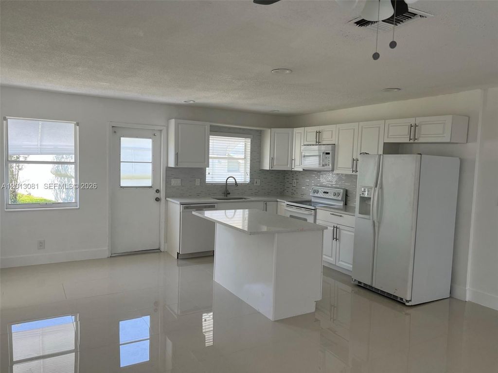 Photo of 145 NW 41st Ct #11, Deerfield Beach, FL 33064 (MLS # A12013081)