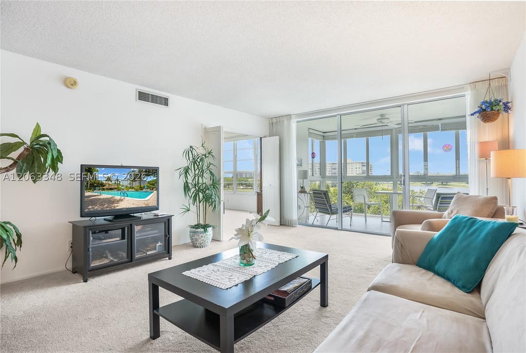 Photo of 3091 N Course Dr #502, Pompano Beach, FL 33069 (MLS # A12063348)