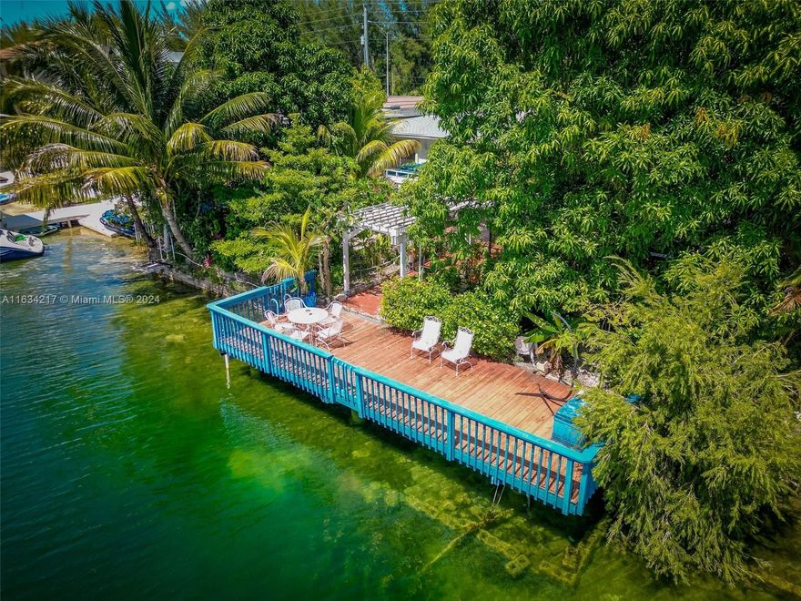 **Rarely Available Tropical Lakefront Home in South Miami**

This stunning 4-bedroom, 2.5-bathroom lakefront home offers the ultimate South Miami lifestyle. Located on the serene shores of Lake Catalina, this property features a spacious, light-filled interior with an open-concept layout perfect for both entertaining and everyday living. The expansive backyard is a tropical paradise with lush fruit trees, a deck, and a private boat dock. Enjoy boating and jet skiing right from your doorstep. Don’t miss this rare opportunity to own a piece of paradise! This home has a brand new roof, move in as-is or make it your own. Some chandeliers not included in sale. Owner needs short term tenancy post closing to prepare move. Showings on weekends only.