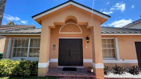 Photo of 19011 NW 79th Ct, Hialeah, FL 33015 (MLS # A11997415)