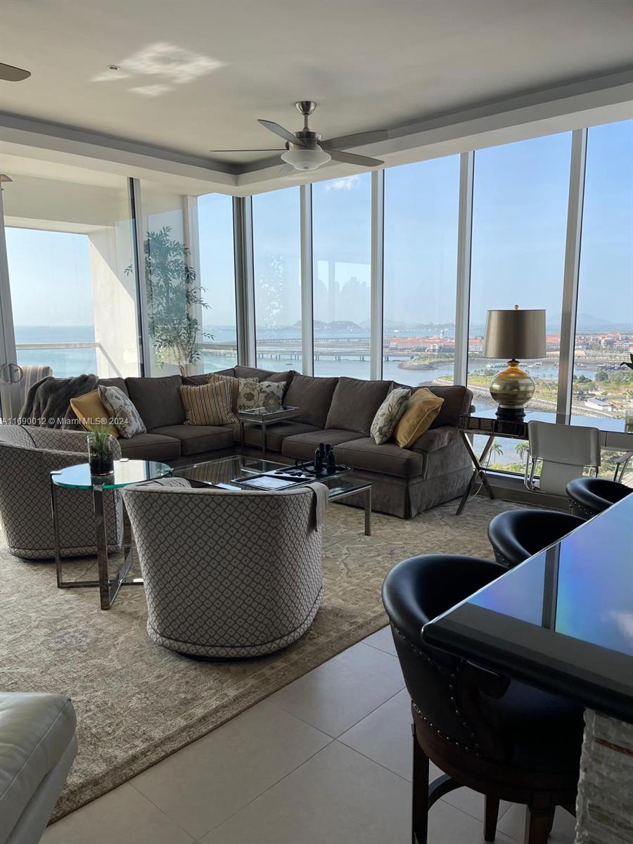 Spectacular Ocean View Penthouse in Panama, Republica de Panama with balcony - for sale or rent! Features 2 bedrooms 2 bathrooms + maid's quarters. Central Air Condition and each bedroom with individual split units. Excellent location close to Casco Viejo and next to the Boulevard Balboa. This Penthouse has beautiful furniture included. Has 3 pools, tennis, racket ball, sauna, exercise room, security, lobby elevator. Excellent opportunity to invest at a great price.