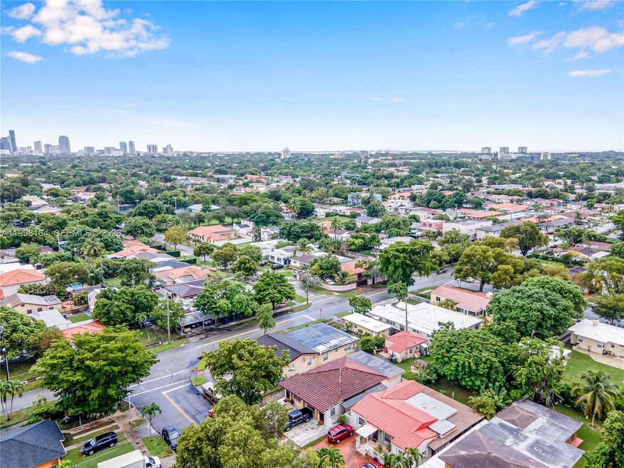 Exceptional income-producing opportunity in the rapidly appreciating Shenandoah neighborhood. This well-maintained multi-unit property sits on a charming, tree-lined street and features three residences: a 4BR/2BA, 2BR/1BA, and a separate 1BR/1BA cottage, common laundry. The current owner has invested over $80,000 in thoughtful upgrades, including updated kitchens, cabinetry, and appliances. Each unit offers separate meters, A/C, and fully equipped kitchens, enhancing tenant appeal and operational efficiency. Generating $6,050 in gross monthly income, the property also includes on-site laundry, ample parking, and a spacious shared backyard. Ideally located near Coral Gables, Brickell, Downtown, and MIA.