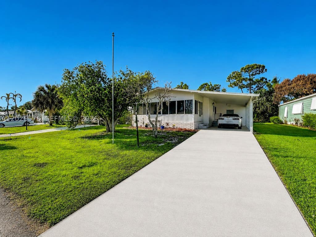 Photo of 8227 Cinnamon Ln, Port St Lucie, FL 34952 (MLS # A12026576)