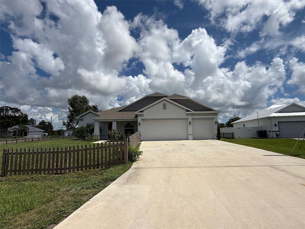 Photo of 1002 SW College Park Rd, Port St Lucie, FL 34953 (MLS # A11831184)