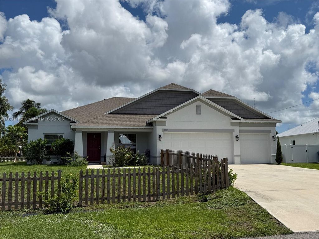Photo of 1002 SW College Park Rd, Port St Lucie, FL 34953 (MLS # A11831184)