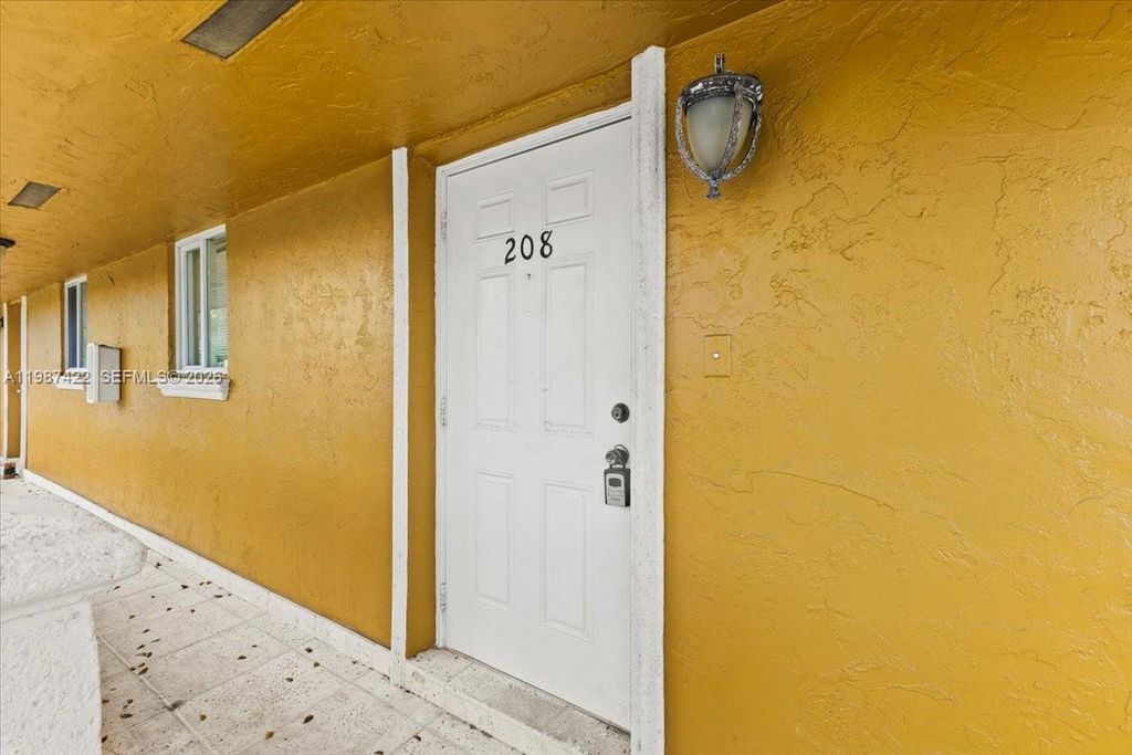 Photo of 2323 Van Buren St #208, Hollywood, FL 33020 (MLS # A11987422)