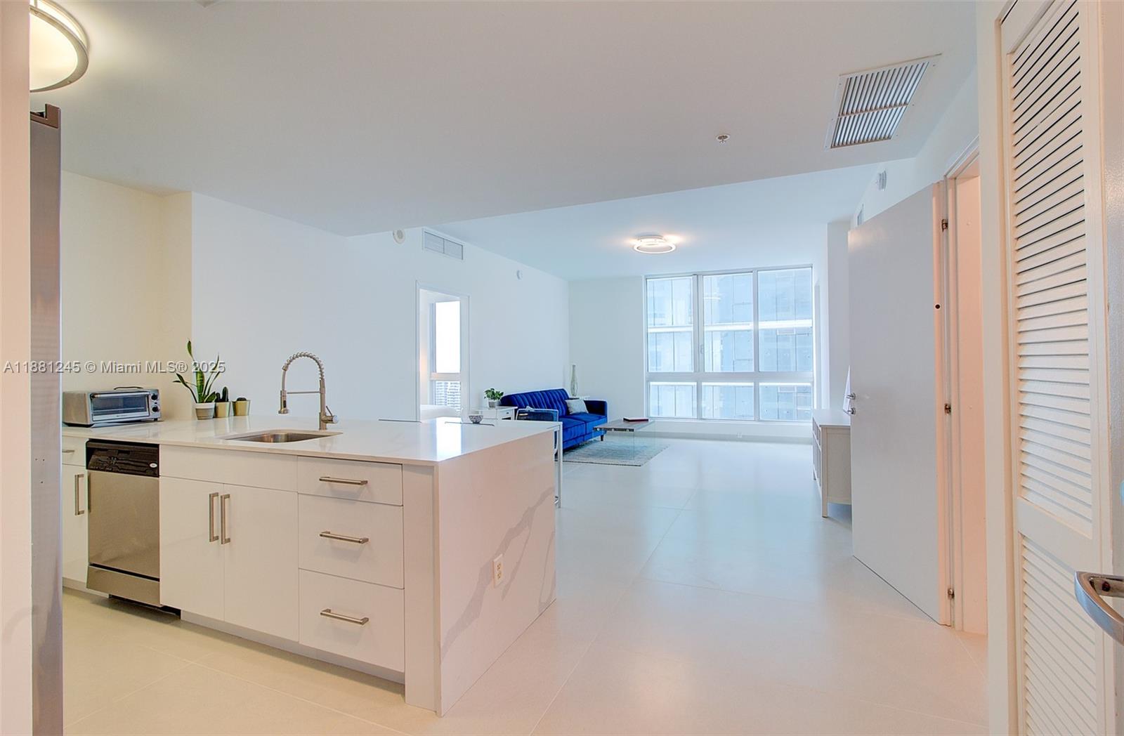 Beautifully renovated this gorgeous, light filled, condo has a spacious, split floor plan layout. Newly installed Italian porcelain floors, new kitchen quartz counter with waterfall countertop, and new kitchen cabinets. Impeccable unit with beautiful water views from every room, 9.4 ft. high ceilings. Abundant closet space, washer/dryer in unit, 1 assigned parking spot, valet parking available. Cable and internet included. Easy access to 95, Miami Beach, Brickell, South Miami and metro rail. Walking distance to many fabulous restaurants, Whole Foods, Cinema, Bayside, and FTX Arena. Pool is closed and under renovation. Unit is tenant occupied until 10/31/2025, 24-hour notice required for showings. Building requires $1,000 security deposit with
tenant application.