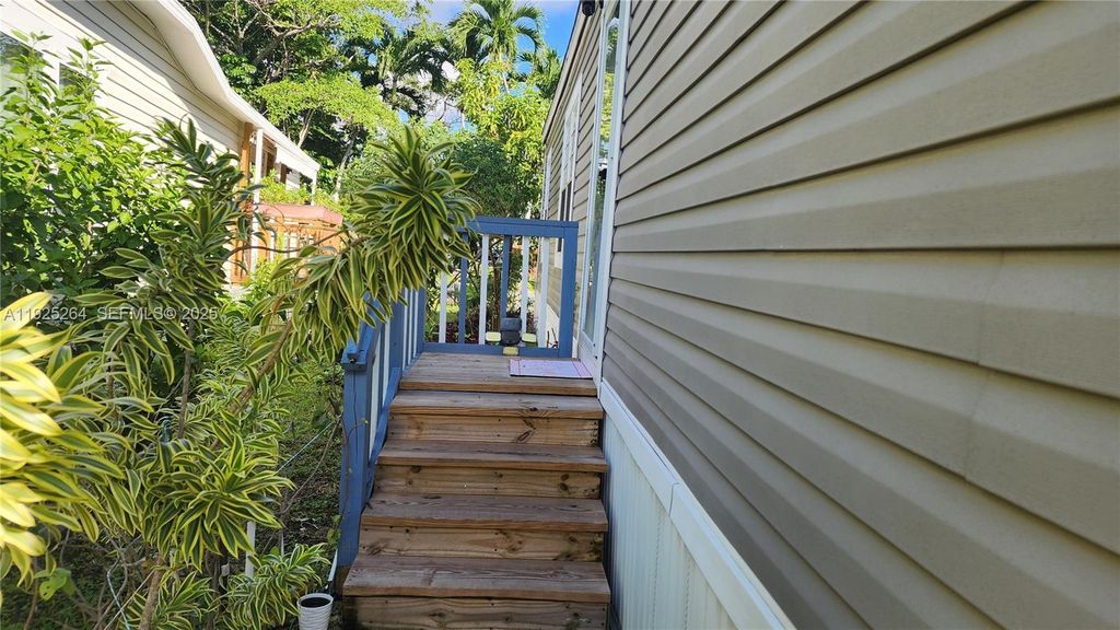 Photo of 822 Heather Lane, Hallandale Beach, FL 33309 (MLS # A11925264)