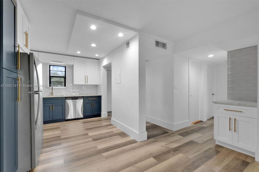 Modern 2-bedroom, 2-bathroom apartment that features an open floor plan and new floors throughout. The kitchen has been beautifully remodeled, showcasing stainless steel appliances, offering generous workspace with its white granite countertops, and incorporating shaker-style cabinets with maple interiors. 2 fully renovated bathrooms that offers space and comfort. The master bathroom stands out with its two closets, one of which is a spacious walk-in, perfect for all your storage needs. For more convenience, the apartment is equipped with two full-size, brand new washer and dryer units. Situated in a prime spot, just a stone's throw away from a variety of shops, restaurants, parks, and worship centers. Rent Includes water, cable and internet. Move in only 1st month and security deposit.