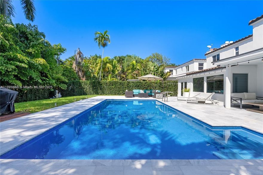 Experience the lifestyle of Miami Beach luxury at this stunning modern and elegant home, located in the prestigious La Gorce neighborhood and the serenity of island-style living...This property has been completely remodelled, more than $500,000.00 in upgrades... Dekstone countertops, Dacor appliances in the kitchen , Subzero wine cooler and much more... . Marble floors throughout the entire property, electric shades, fireplace.....Chic interior features interconnecting the almost 3000 square footage living areas...Breathtaking backyard plenty of lush tropical landscaping with a remodeled swimming pool with new Turkish Carrera tiles. ...ELEVATION CERTIFICATED ATTACHED (7.7 ELEVATION)...